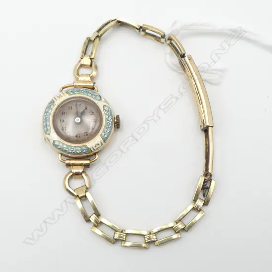 9ct YELLOW GOLD EARLY 20thC ladies WRISTWATCH enamel framed front cover plated strap