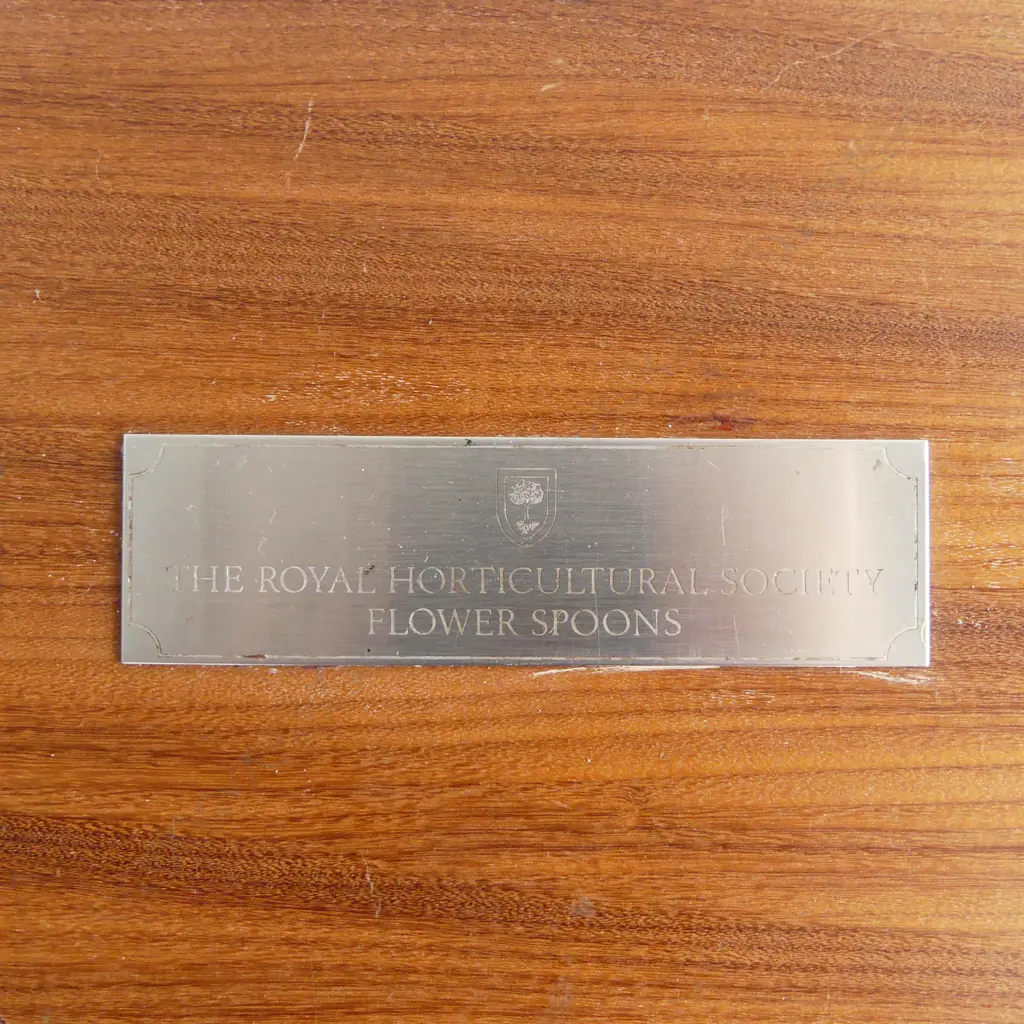 12 STG SILVER & 24CT INSET RHS FLOWER SPOONS, SHEFFIELD 1973 315gms, CASED W.480mm Image 1++