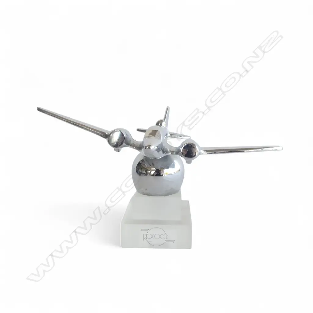CHROME AIRPLANE ON STAND, POSSIBLY C-47 ( ADAPTED DC 3) ON LATER PERSPEX BASE 'ROCOCO’, W.220mm Image 1++