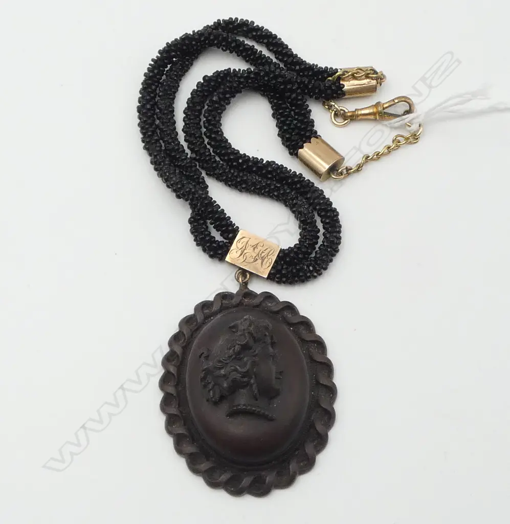 VICTORIAN VULCANITE PENDANT ON JET BEAD NECKLACE WITH 9CT GOLD CAPS Image 1++