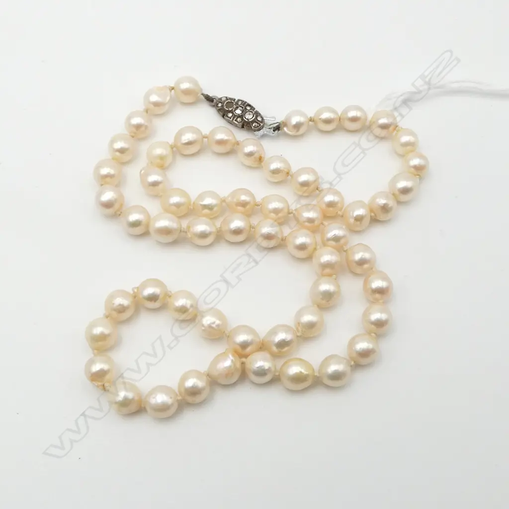 SINGLE STRAND OF SEMI-BAROQUE PEARLS Image 1++