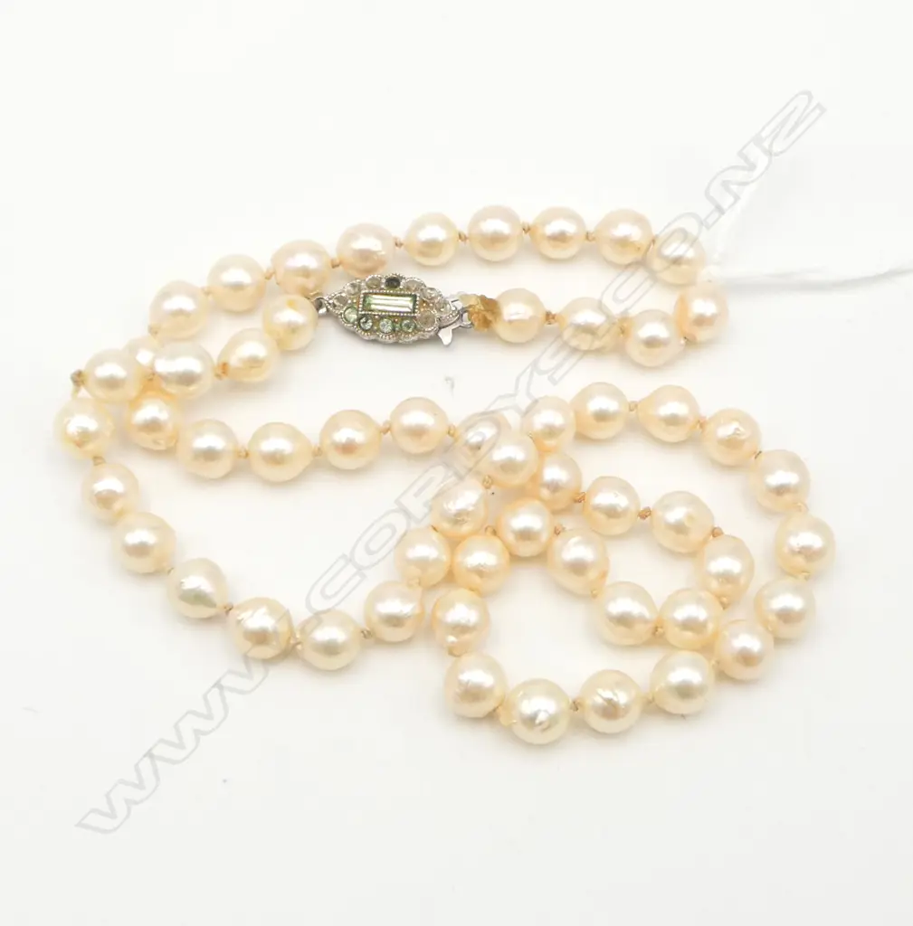 SINGLE STRAND OF SEMI-BAROQUE PEARLS Image 1++