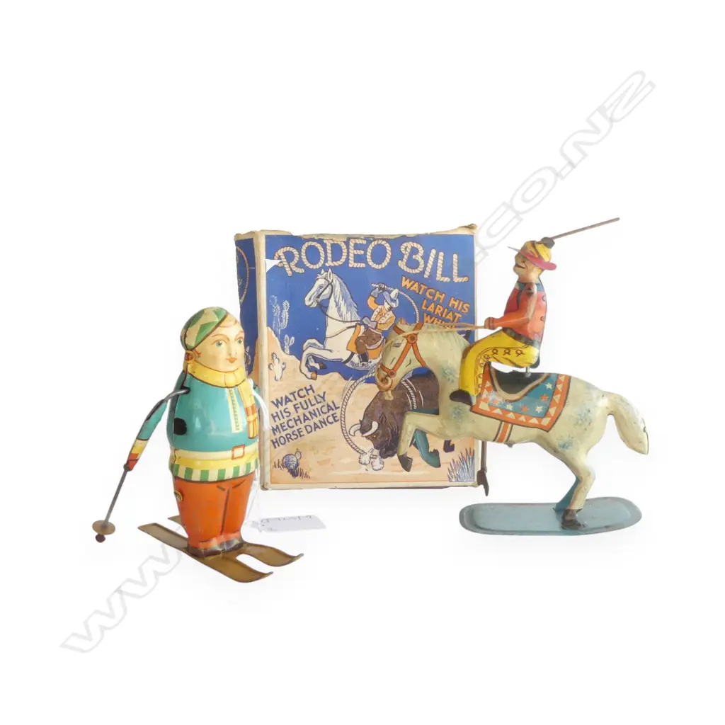 2 VINTAGE WIND UP TOYS, GERMAN SKIIER, ENGLISH 'RODEO BILL' w. ORIG. BOX H.150mm Image 1++