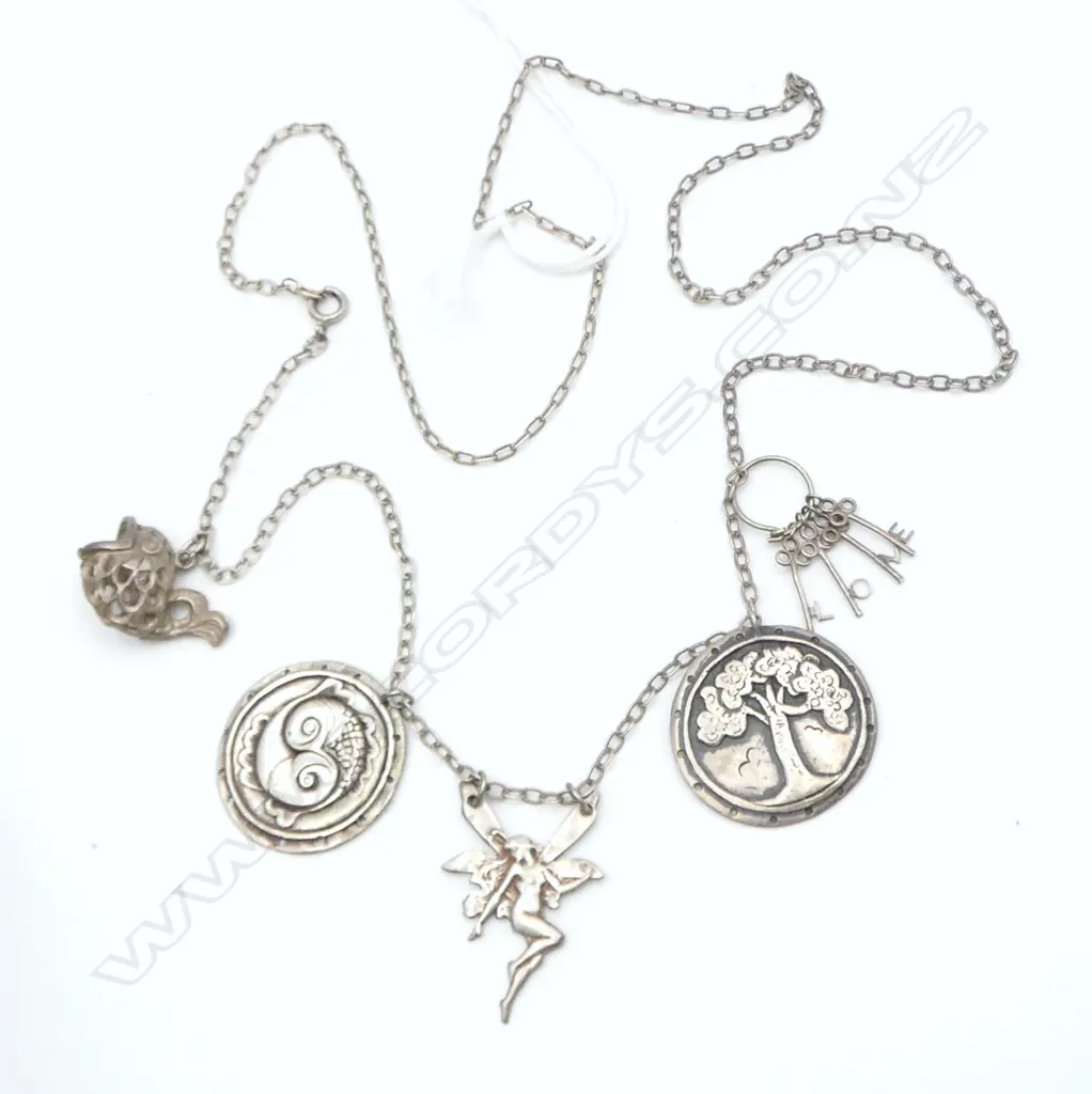 SILVER NECKLACE W VARIOUS DROPS: fairy + pisces  + fish  + keys etc 20+gms Image 1++