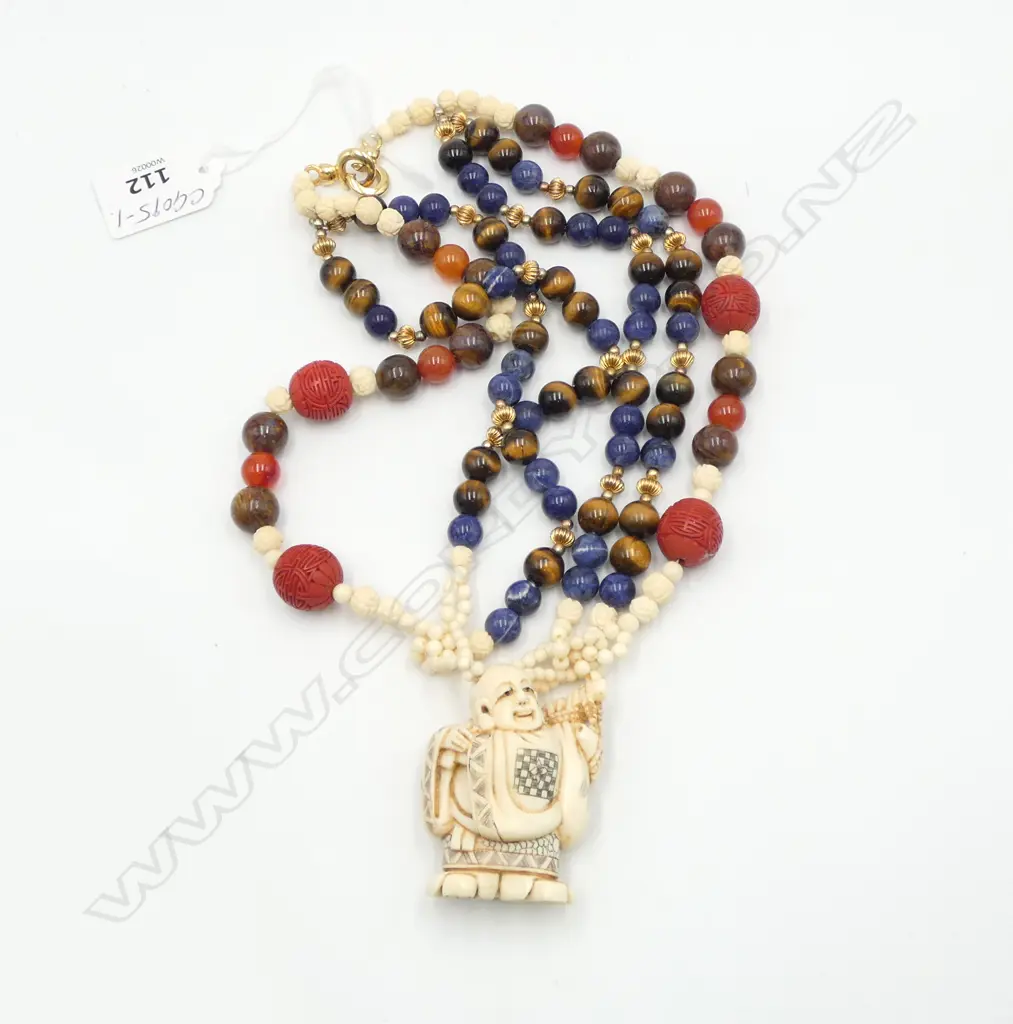 **RTV** ORIENTAL NECKLACE WITH CINNABAR/IVORY/LAPIS terminating in an ivory netsuke Image 1++
