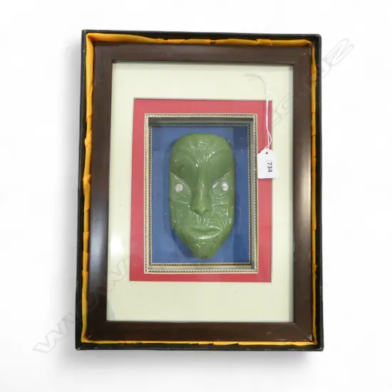 CARVED GREEN RESIN MAORI TIKI FACE, FRAMED & BOXED 355x265mm overall