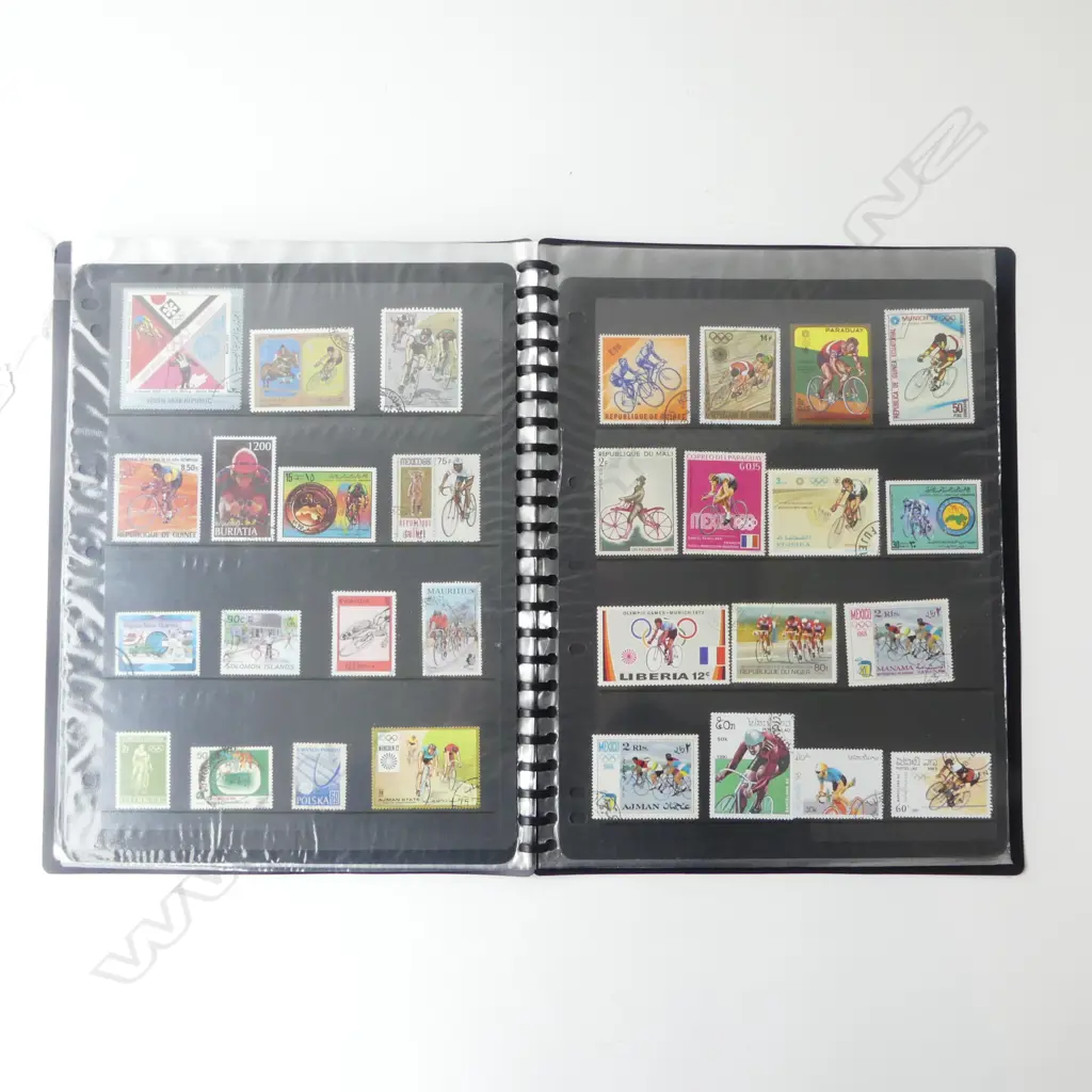 WORLD STAMPS IN BLACK ALBUM; THEMATIC CYCLING THEME Image 1++