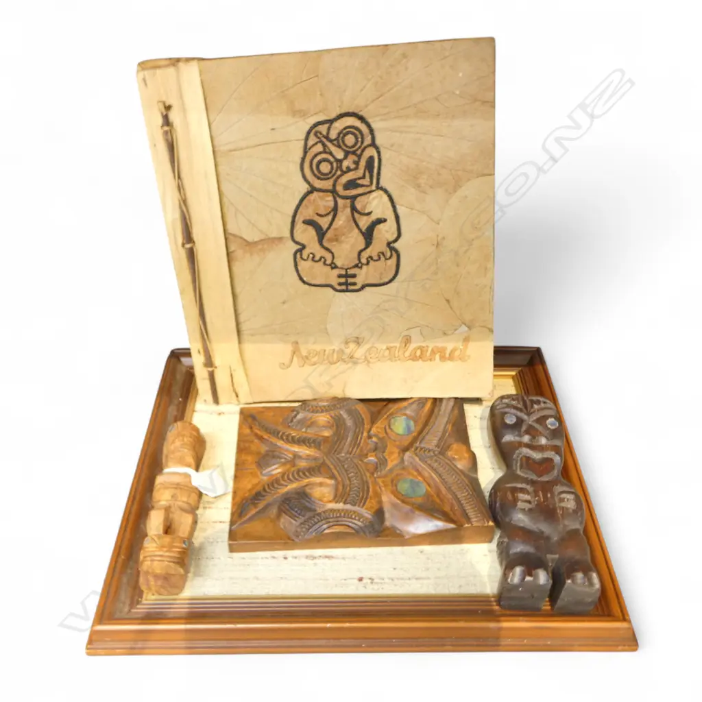 4 MAORI THEMED PCES; FRAMED CARVED PANEL, ALBUM w. VINTAGE WORLD POSTCARDS, 2 CARVED WOODEN FIGURES H.175mm Image 1++