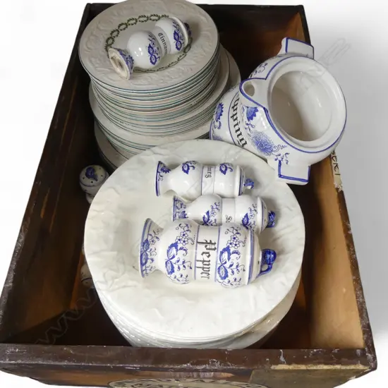 PLATES IN WOODEN CRATE