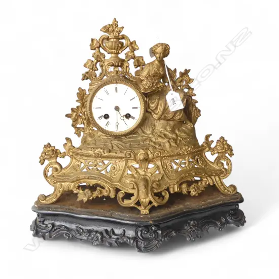 A LATE 19TH CENTURY GILT MANTLE CLOCK ON CARVED TIMBER BASE (FAULTS)