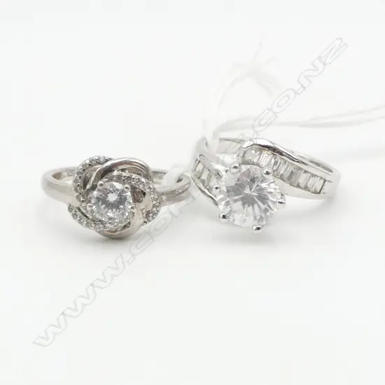 2 STG SILVER WHITE STONE CZ ? DRESS RINGS (SIZE P approx)