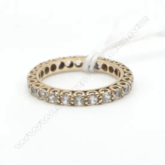 9ct Y/GOLD WHITE SAPPHIRE ETERNITY BAND. 1.9gms SIZE M