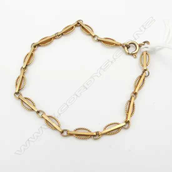 14ct GOLD BRACELET rail link w oval wire. 6gms
