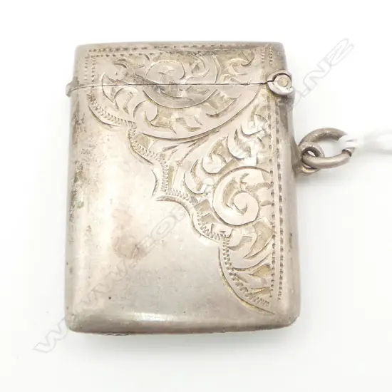 SILVER VESTA 2/3's scroll engraved. With suspension loop. 22.gms