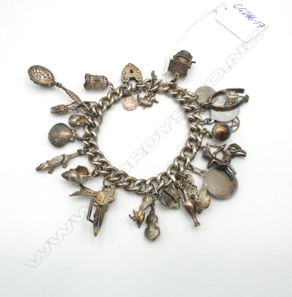 VINTAGE SILVER MULTI CHARM BRACELET lge solid curb link chain 98gms Image 1++