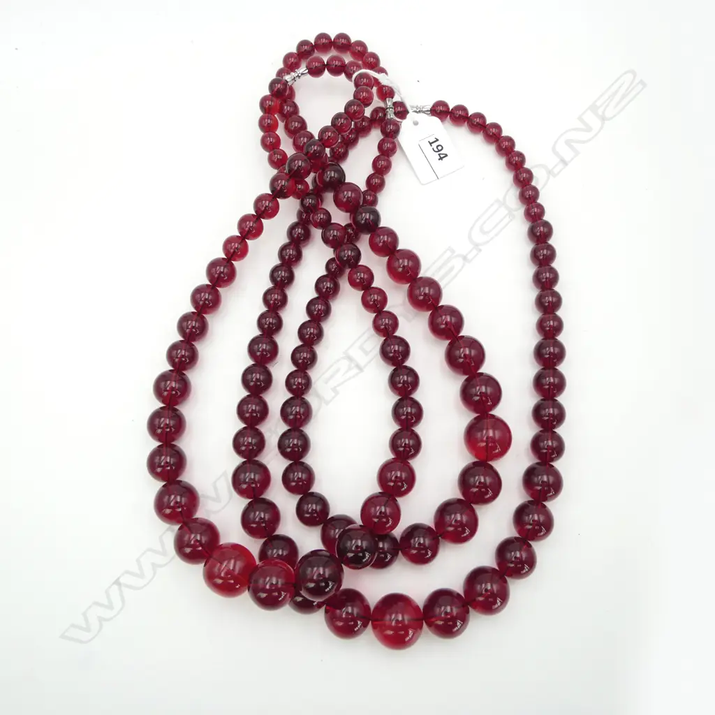 3 STRINGS CHERRY COLOURED GRADUATING BEADS Image 1++