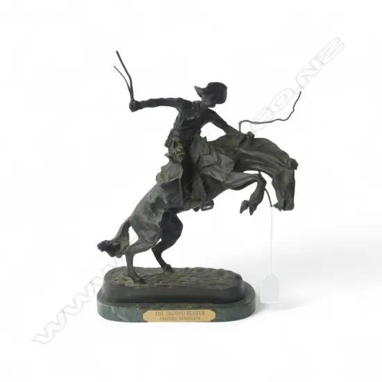 BRONZE AFTER REMINGTON 'THE BRONCO BUSTER' H.325mm