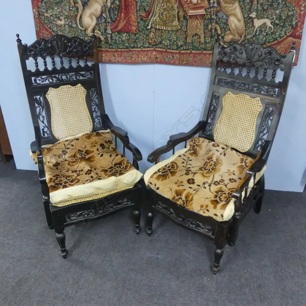 PR EARLY 20thC HEAVY SOLID CARVED EBONY ANGLO INDIAN PARLOUR ARM CHAIRS WITH WYCOMBE CANE with loose cushions Image 1++