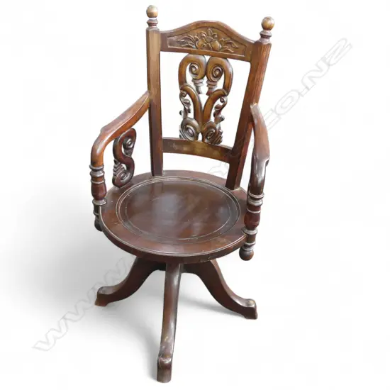 ORIENTAL MAHOGANY SWIVEL CHAIR