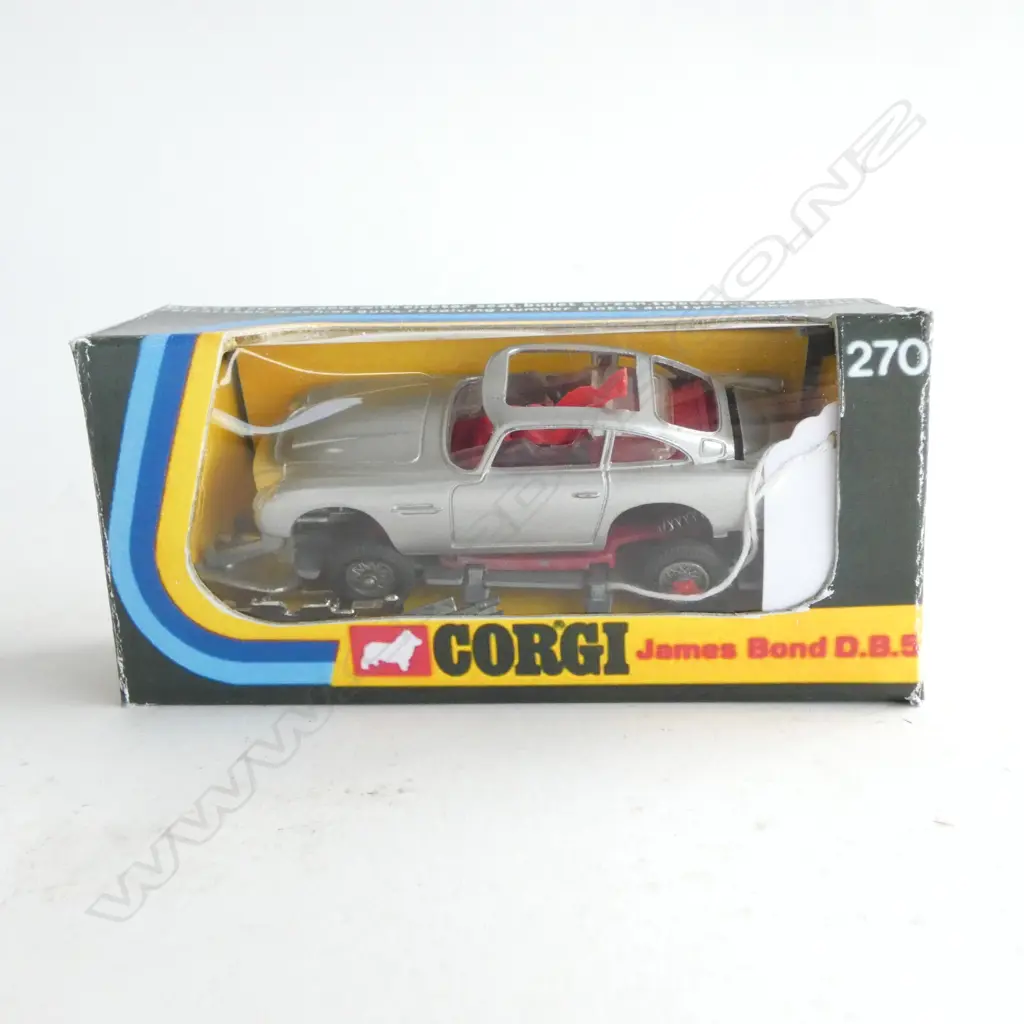 CORGI TOYS JAMES BOND ASTON MARTIN DB5 L.100mm screw missing, w. reproduction box Image 1++