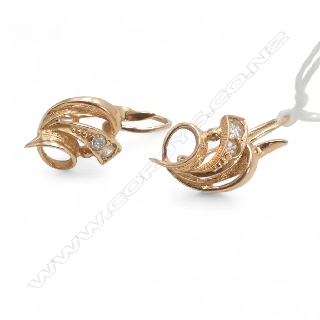 14ct gold earrings. each w 2 old cut diamonds. Marked. Hooks for pierced ears. 3.8gms. Image 1++
