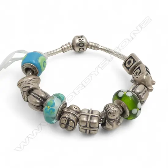 S/SILVER PANDORA BRACLET & BEADS 58G