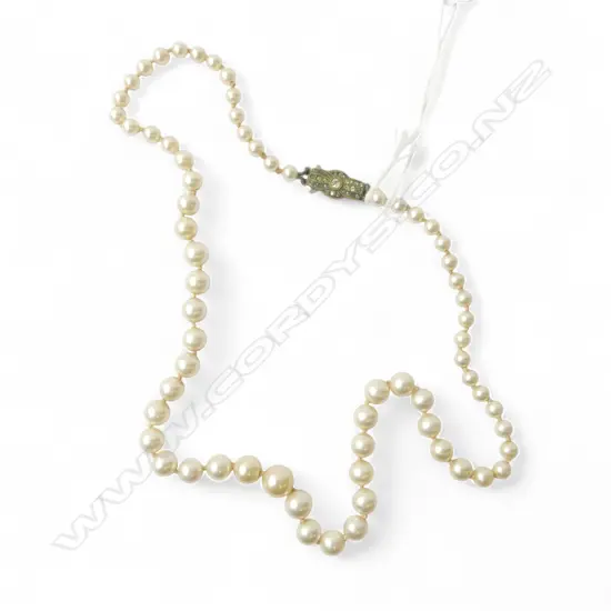 STRING OF INDUVIDULY KNOTTED FAUX PEARLS