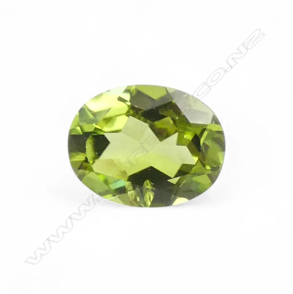 UNSET OVAL CUT PERIDOT Image 1++