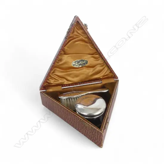 CASED 'THE JEWEL CASKET AUCKLAND N.Z.' DRESSING TABLE SET, CHESTER 1923, brush & jar