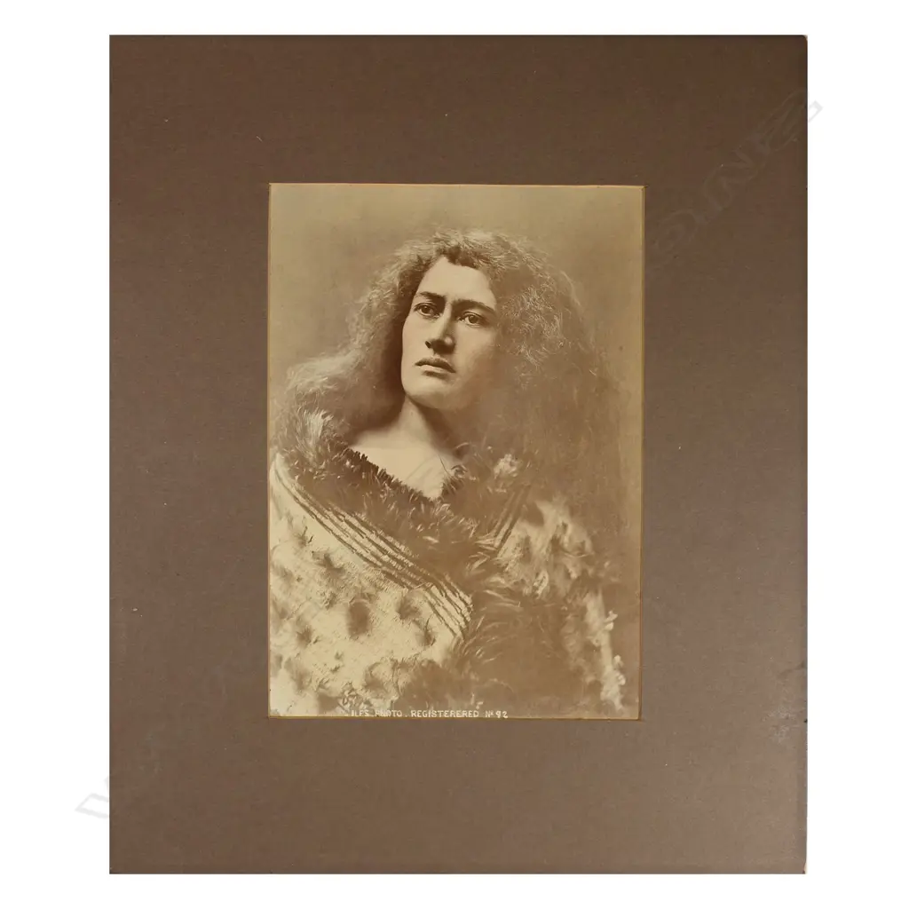 ILES HAND TINTED ALBUMEN PRINT, MAORI WOMAN WEARING KOROWAI CLOAK, 190x135mm (some fading) Image 1++
