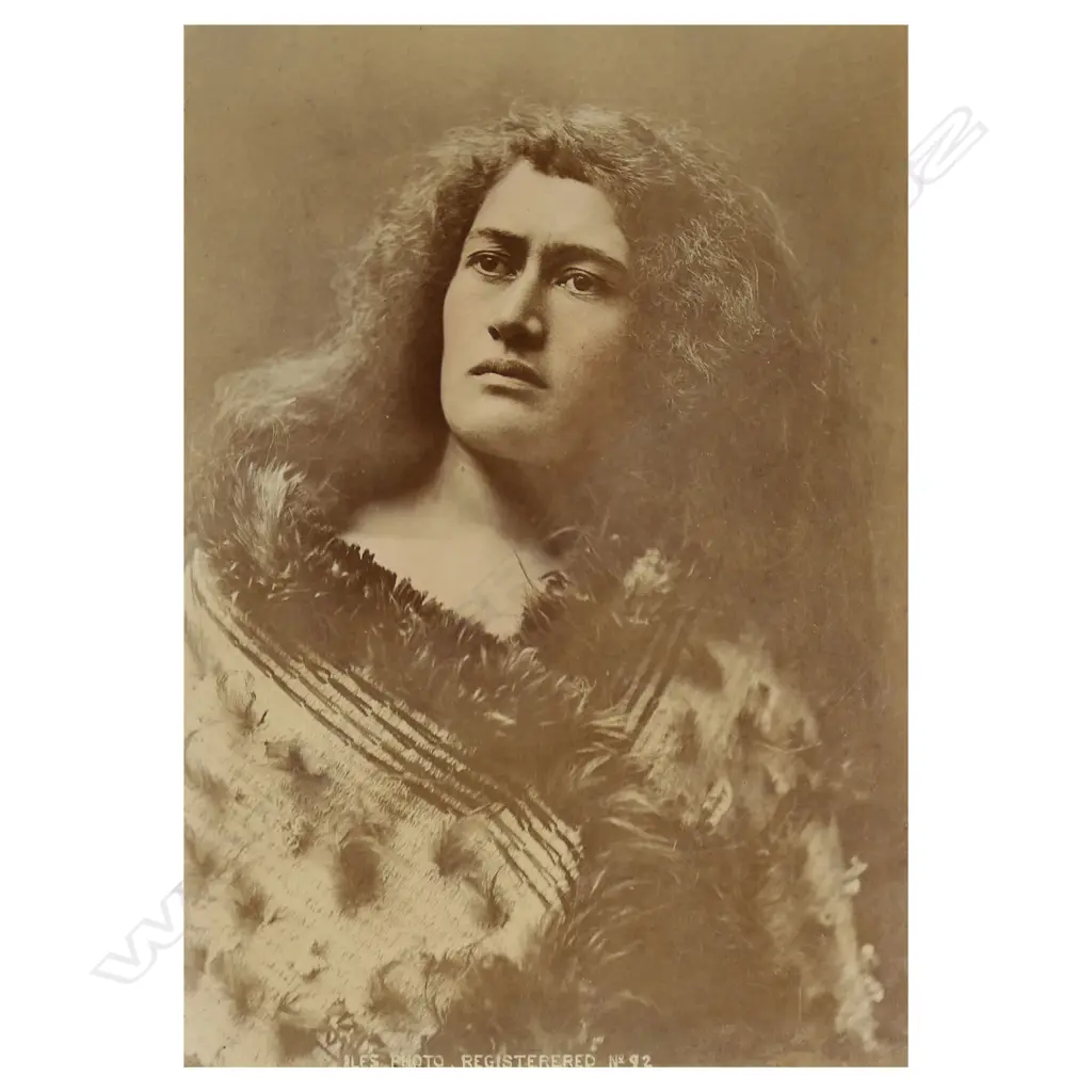 ILES HAND TINTED ALBUMEN PRINT, MAORI WOMAN WEARING KOROWAI CLOAK, 190x135mm (some fading) Image 1++
