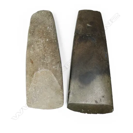 Two large stone adzes,