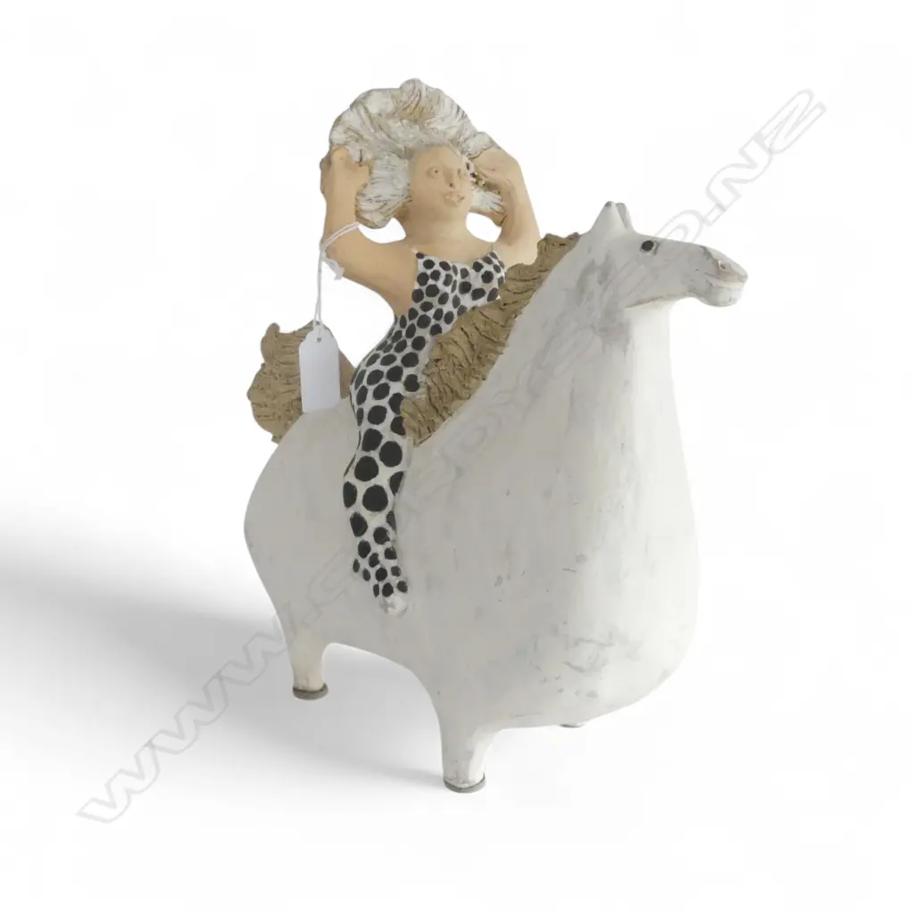 VIRGINIA ANGUS STUDIO POTTERY SCULPTURE; EQUESTRIAN '1026' the woman in polka dot jumpsuit.   H.300 W.310mm Image 1++