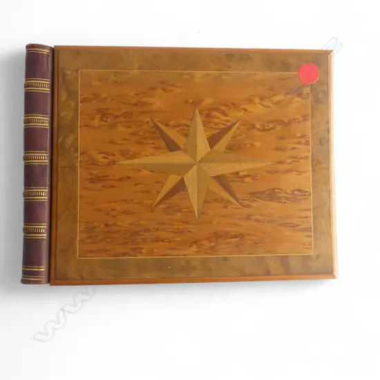 A MARQUETRY BOOK COVER WITH LEATHER BINDING 265 X 360 mm