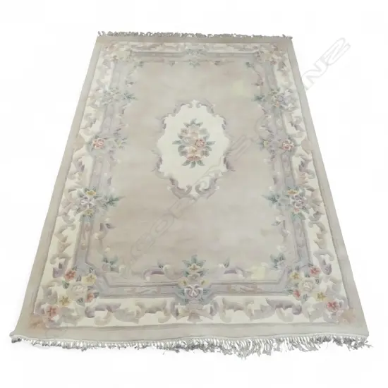 A CHINESE WOOL RUG PINK AND IVORY TONES 1800 x 2800mm