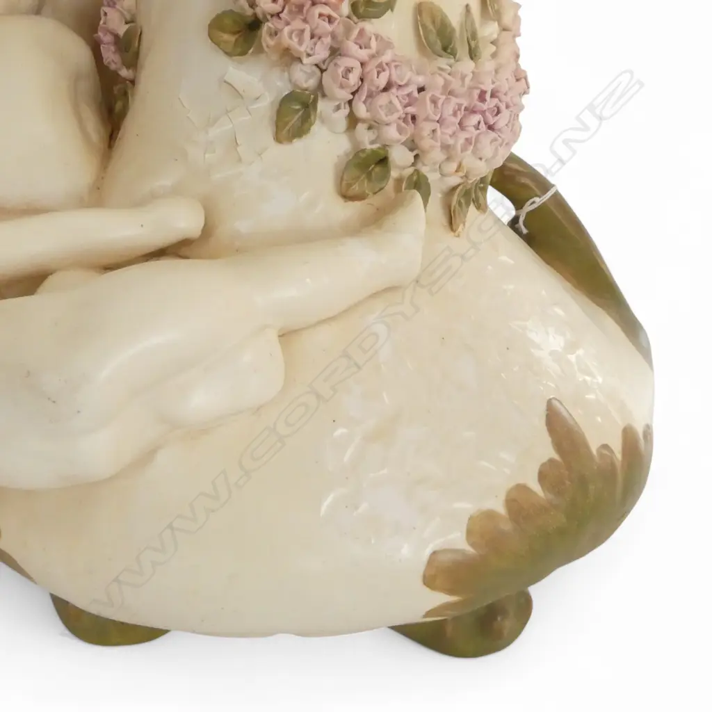 A CERAMIC FIGURAL VASE DEPICTING PUTTI AND FLORAL GARLANDS 470 mm (H)  Image 1++
