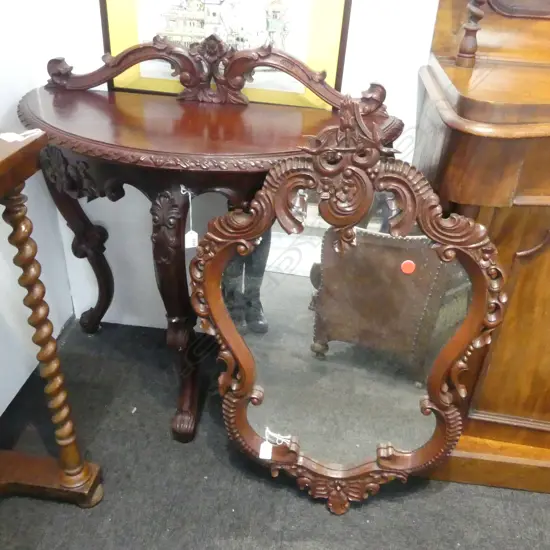 A TWO PIECE MAHOGONY CONSOLE TABLE AND MIRROR