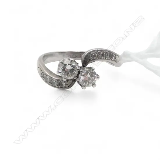 14CT WG 2 STONE DIAMOND TWIST RING 2.78gms SIZE N1/2 (Broken shoulder)