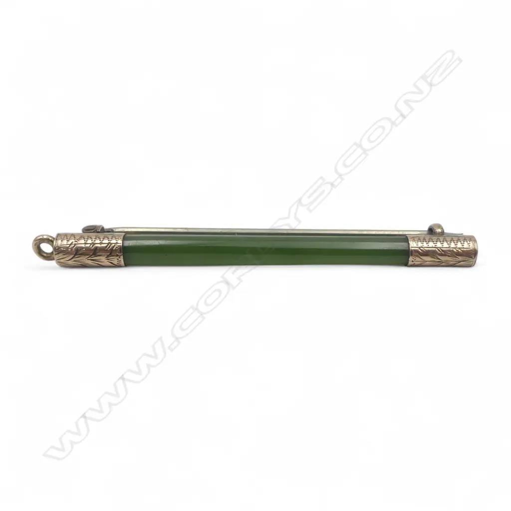 POUNAMU BROOCH WITH 9CT GOLD CAPS 2.56gms Image 1++