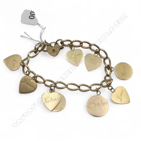 9ct BRACLET w. 9 CHARMS 38.9gms