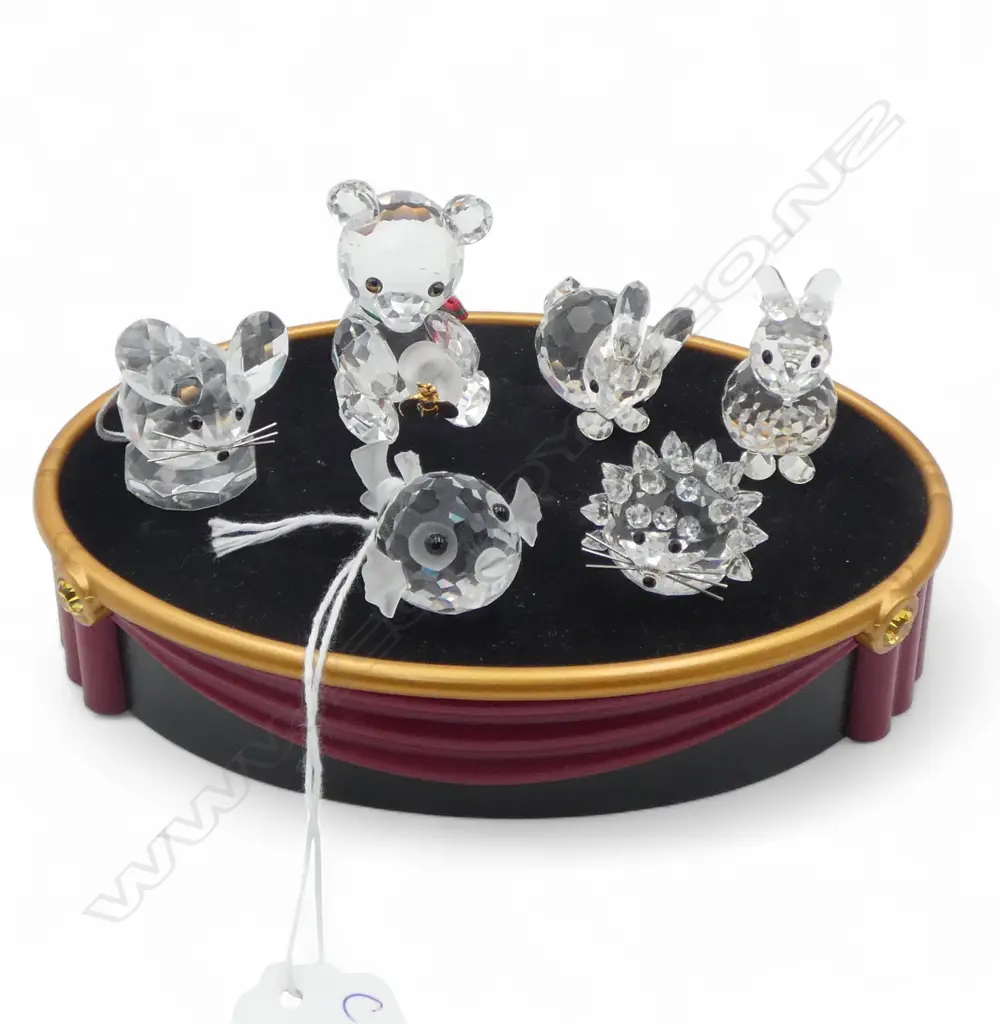 6 SWAROVSKI ANIMALS; BEAR H.40mm, FISH, MOUSE, HEDGEHOG, 2 RABBITS + OVAL STAND W.140mm Image 1++