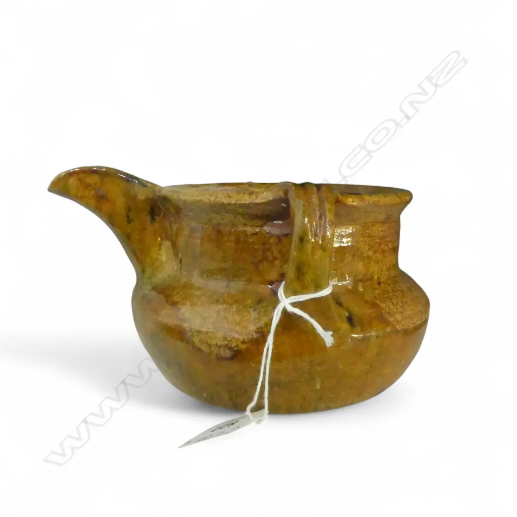HAND MADE POTTERY JUG POSSIBLY JOVA RANCICH slotted spout. Incised top. Rounded base. Unmarked. Dia.140mm Image 1++