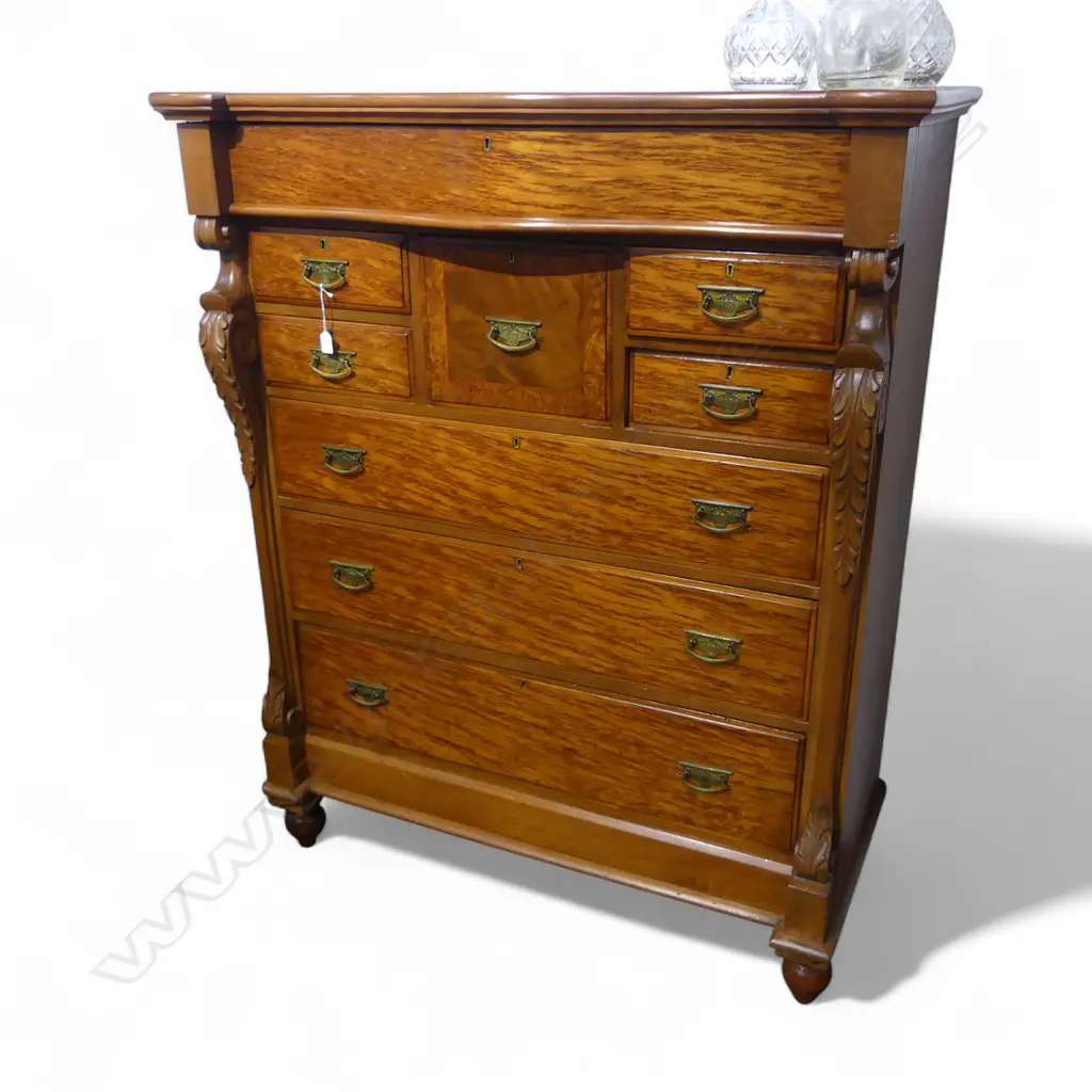 NINE DRAWER MOTTLED KAURI SERPENTINE TOP SCOTCH CHEST WITH FRIEZE DRAWER & CARVED COLUMNS  1210x570x1510mm Image 1++