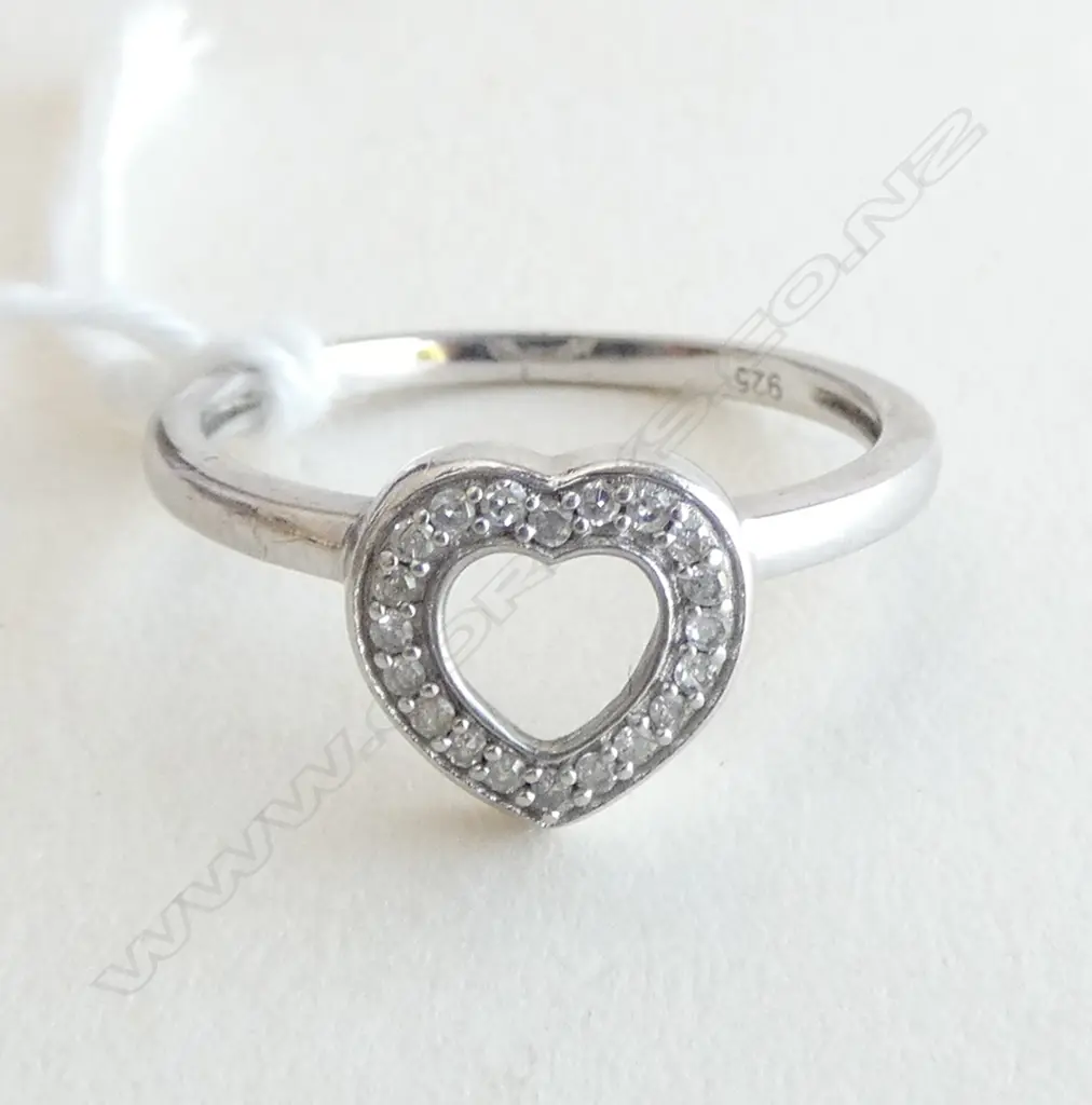 STG. SILVER AND DIAMOND RING SIZE N Image 1++