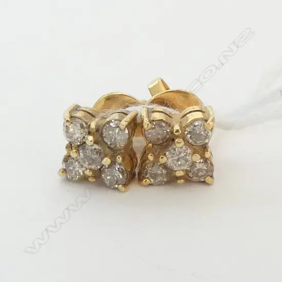 PR GOLD AND 5 DIAMOND EARRINGS. testing as 12ct. note 5 diamonds in each. 2.18gms