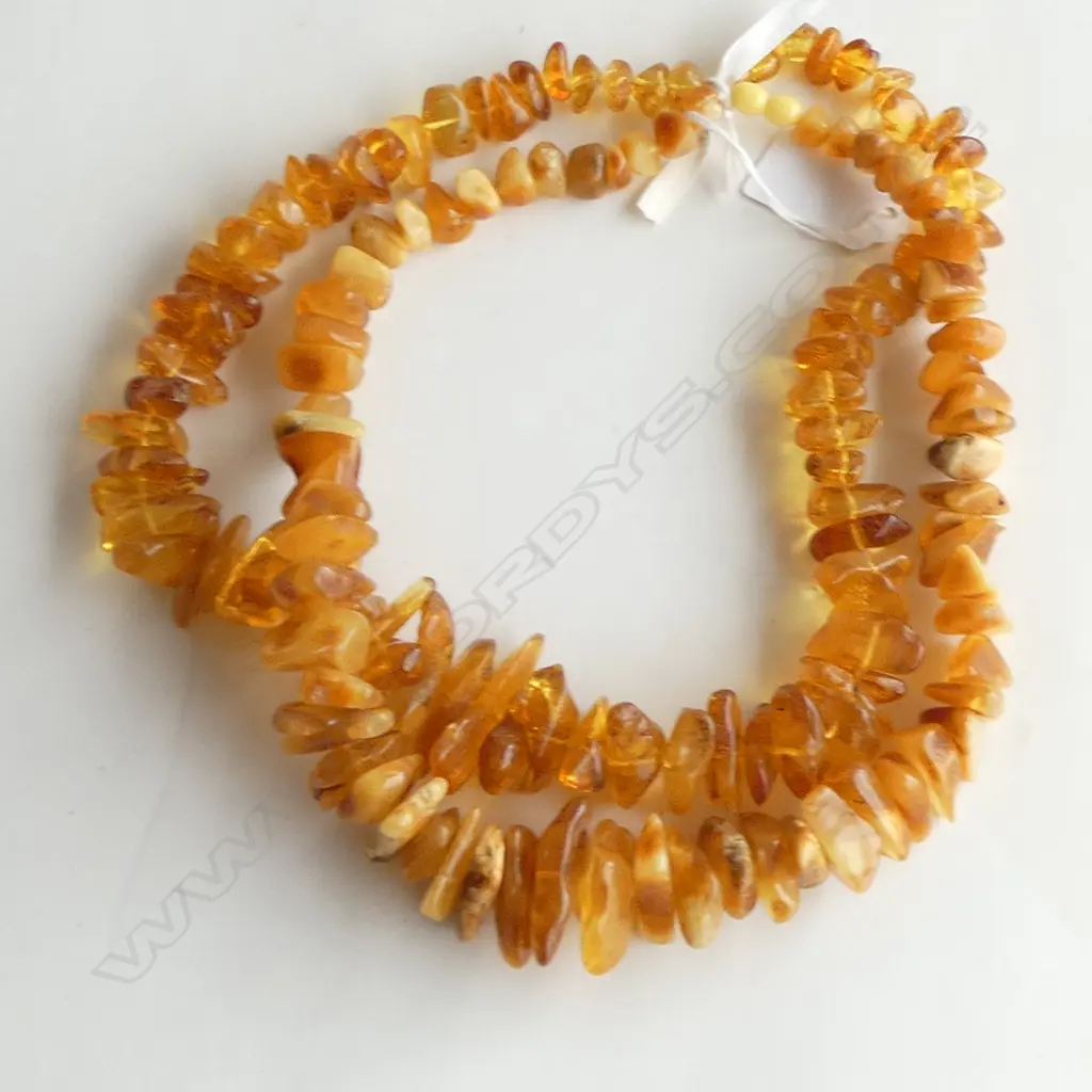 2 AMBER NECKLACES Image 1++