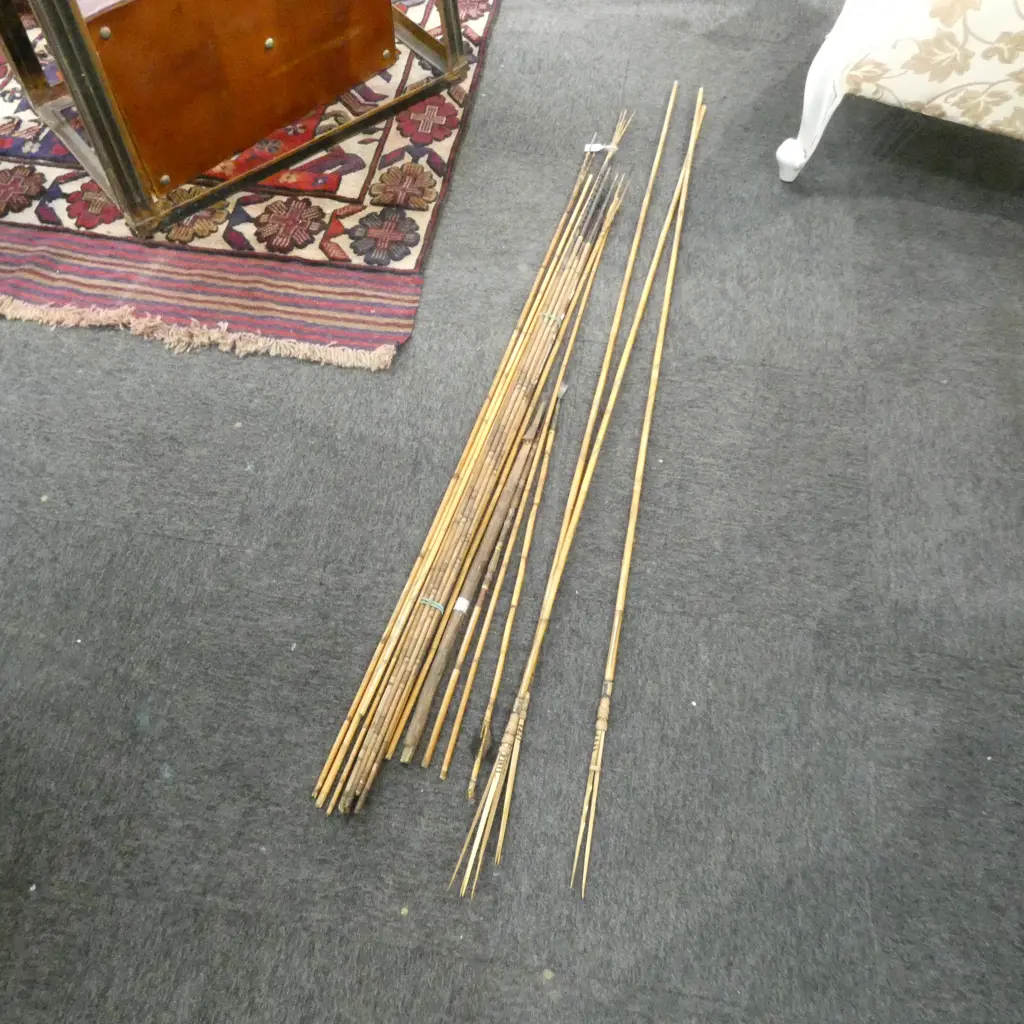GROUP OF 12 + TRIBAL BAMBOO & OTHER SPEARS some stained & coloured carved detail Image 1++