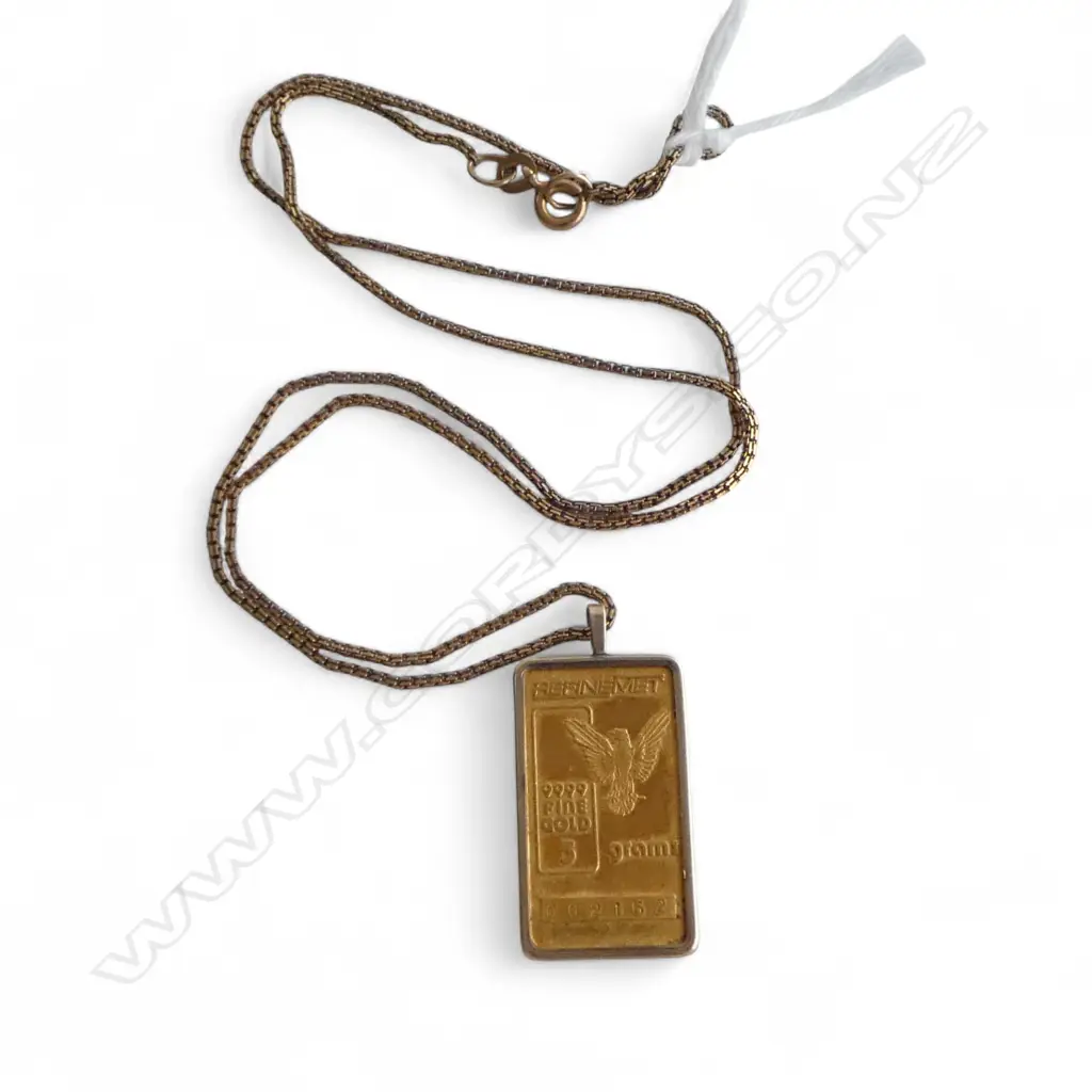 999CT GOLD 5gms INGOT IN 9CT GOLD MOUNT AND 9CT GOLD CHAIN 7.8gms total Image 1++