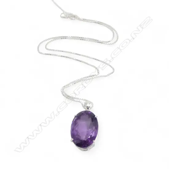 SILVER OVAL CUT AMETHYST PENDANT on SILVER CHAIN