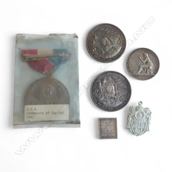 6 white metal MEDALLIONS: 2 X lge 1967 intro decimal coinage + 1924 singing medal + one penny stamp + USA 1893 Cent. +